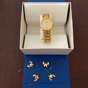 Ladies 14kyg Tissot watch/4 extra links.